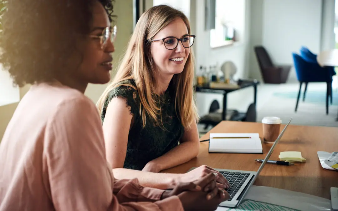 Two Female Professionals Working