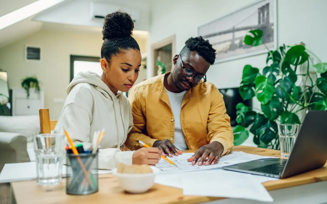 Couple working together on their finances.
