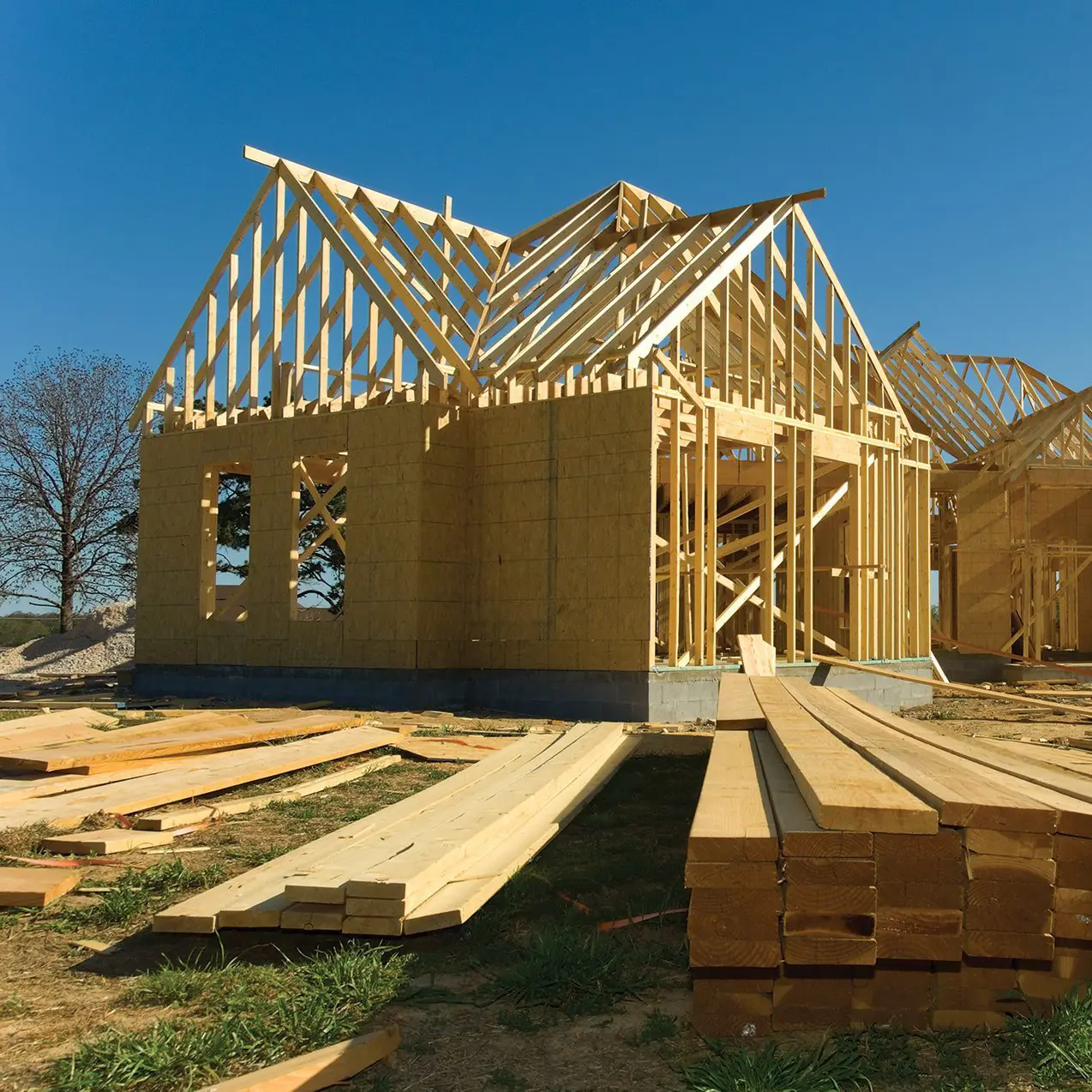 Man sitting on bench outside.