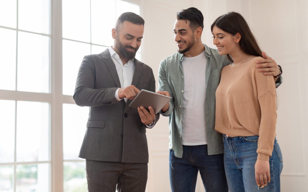 Couple discussing their housing options with a mortgage professional