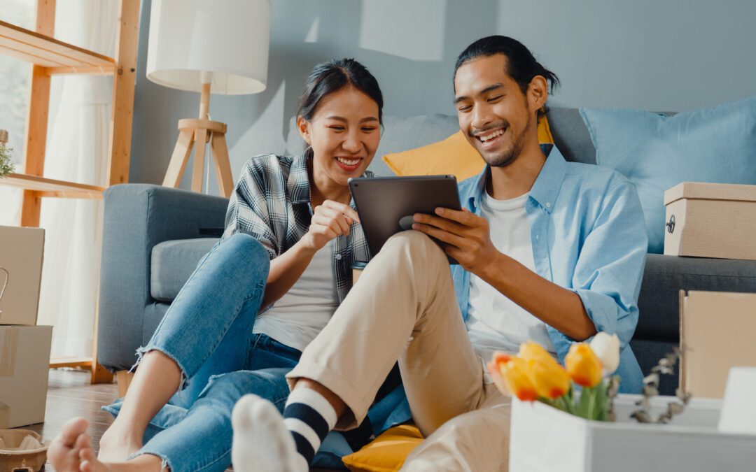 Happy couple considering their options for home buying.