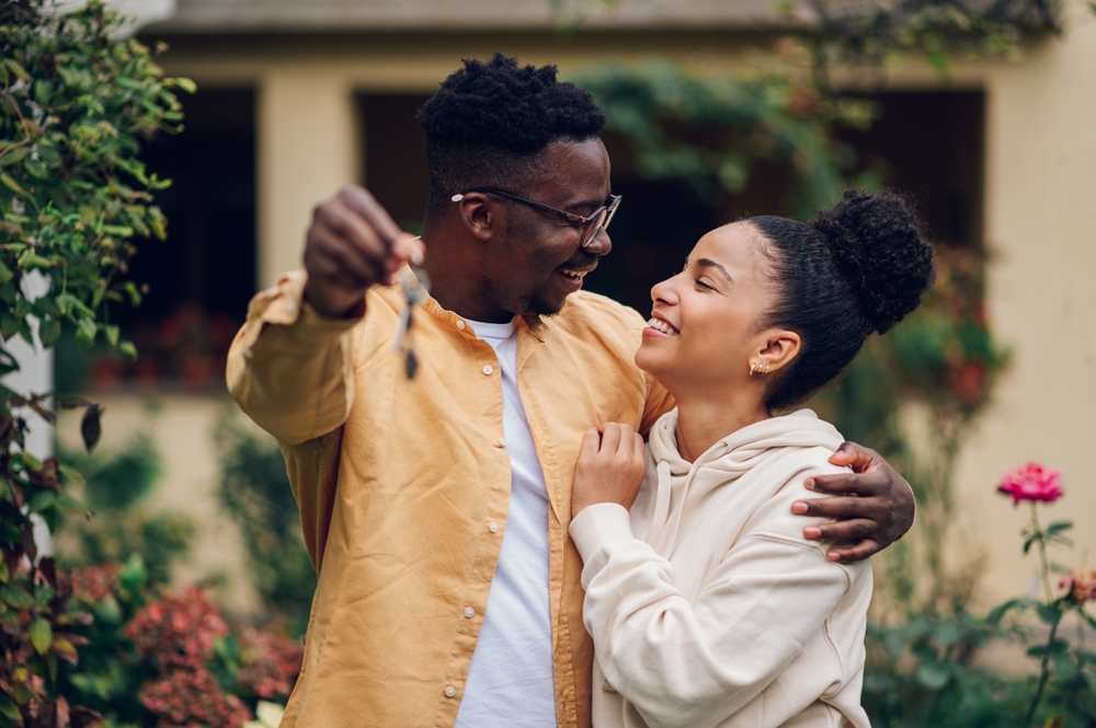 A couple is excited about buying a home.